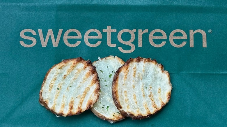 Sweetgreen ripple fries on a bag that says Sweetgreen