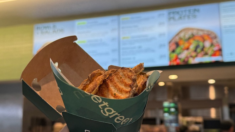 sweetgreen ripple fries with menu in background