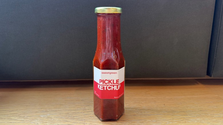bottle of pickle ketchup from Sweetgreen sitting on a counter