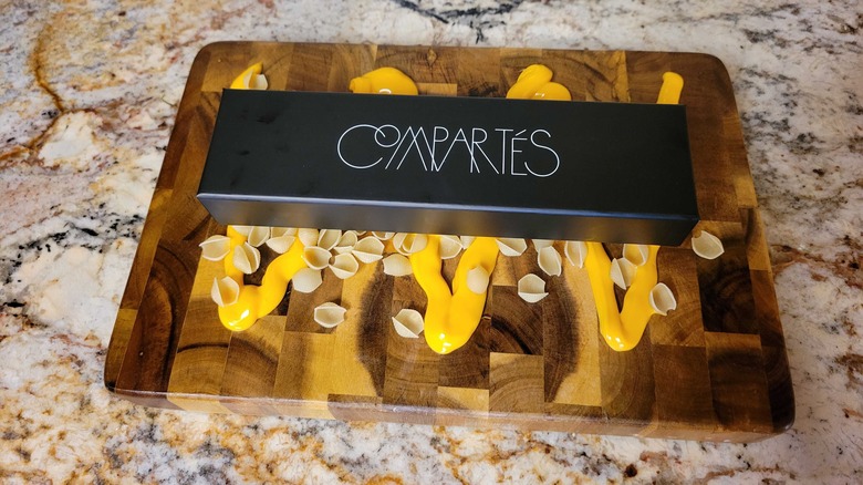 Compartes box on cheesy board