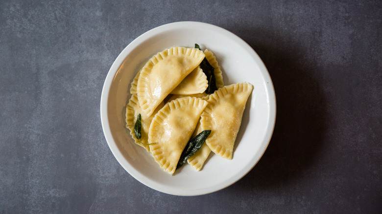 pumpkin ravioli in white dish