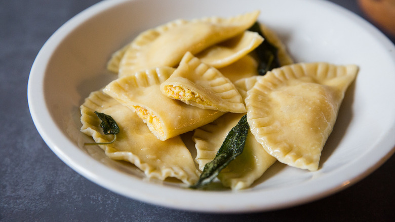 pumpkin ravioli in white dish