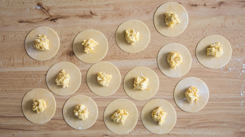 unfinished ravioli rounds on table