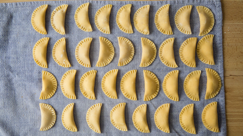 ravioli drying on kitchen towel