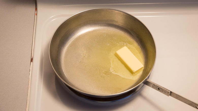 butter melting in frying pan