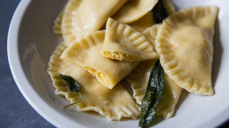 pumpkin ravioli in white dish