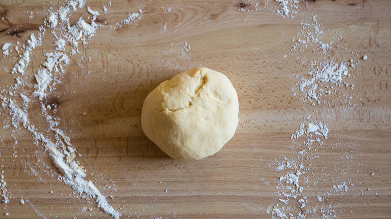 Pasta dough ball on table