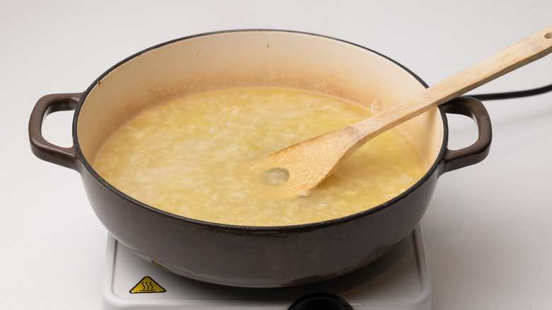 chicken stock in a pan