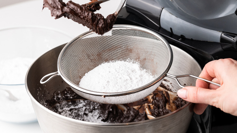 powdered sugar in sieve