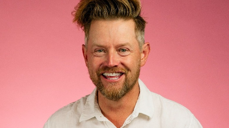 Richard Blais smiling for headshot