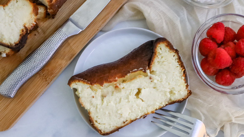 close up of a slice of richest loaf pan Basque cheesecake