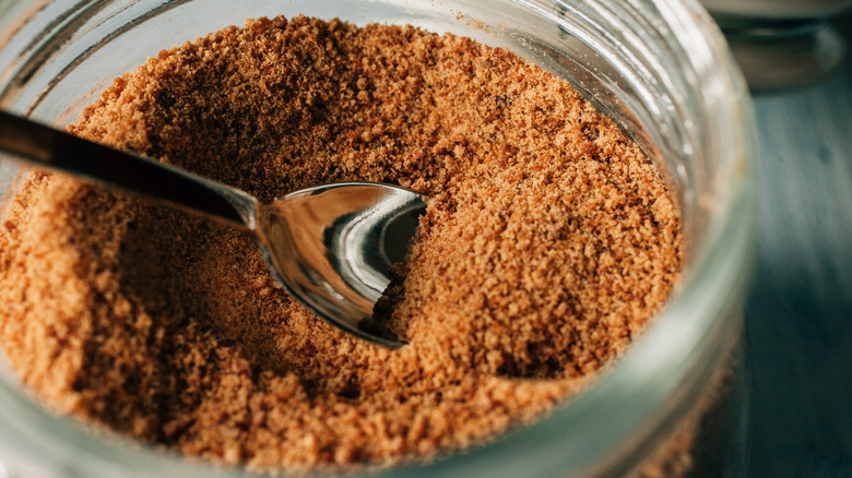 spoon in raw sugar