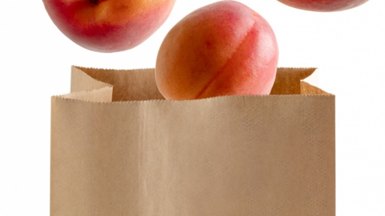 peaches in paper bag