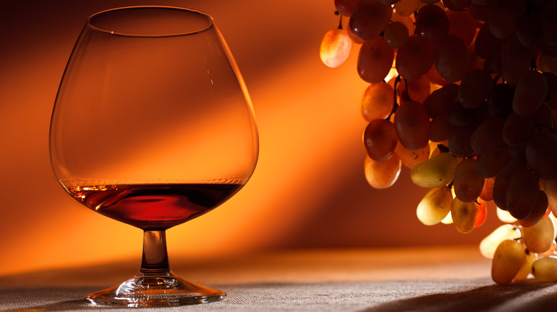 Cognac glass with grapes