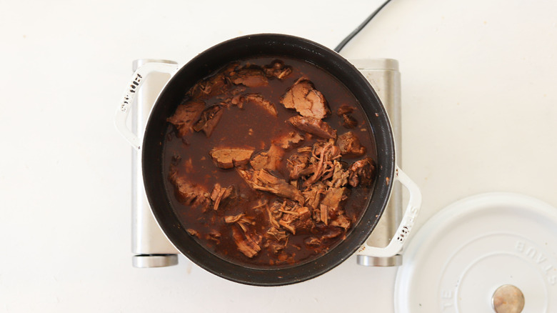 shredded braised beef in pot