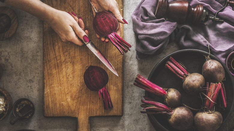 person preparing beets