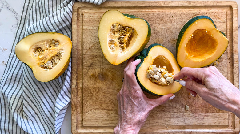 scraping seeds from squash