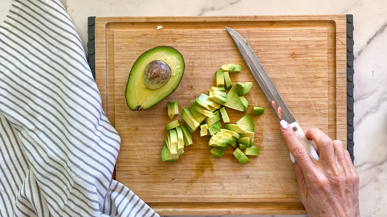 diced avocado on board