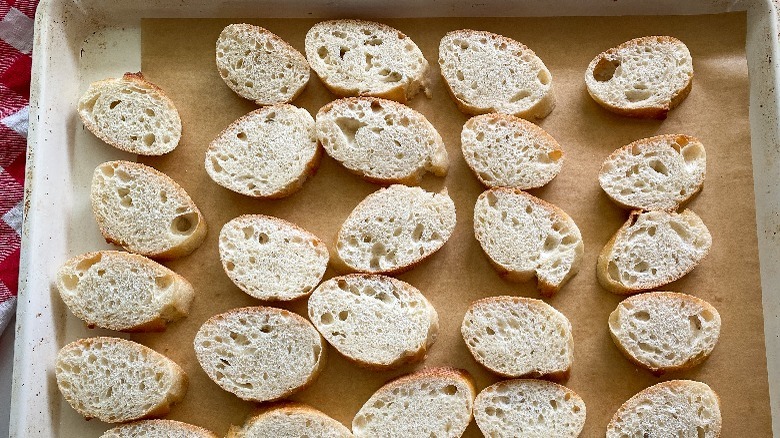 sliced bread on baking tray
