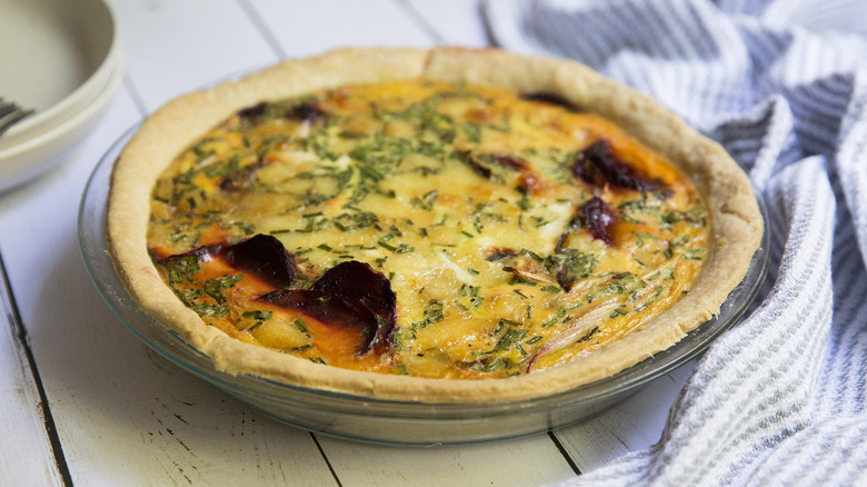 colorful beet quiche on table