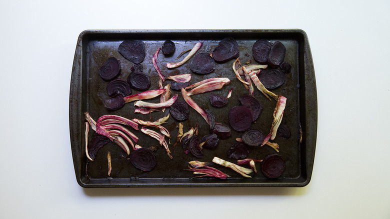 roasted vegetables on baking sheet