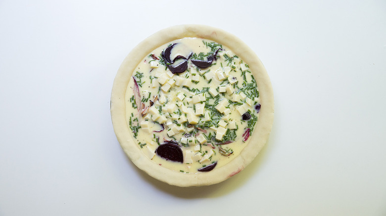 unbaked beet quiche on table