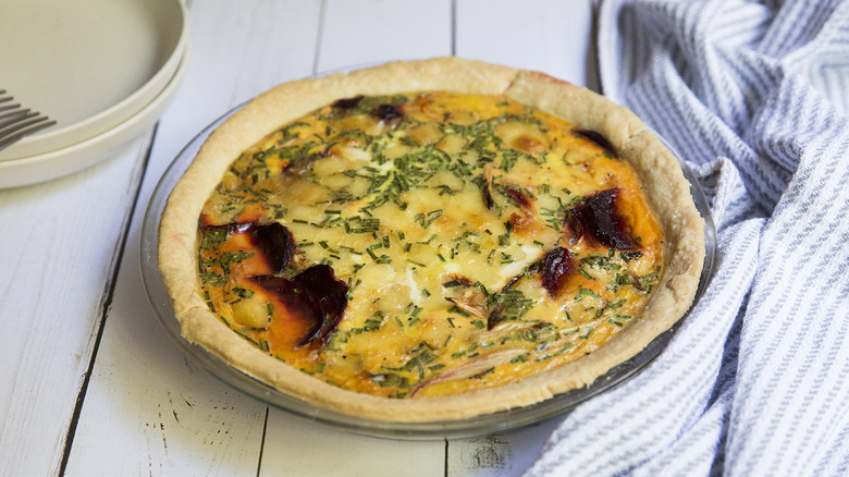 colorful beet quiche on table