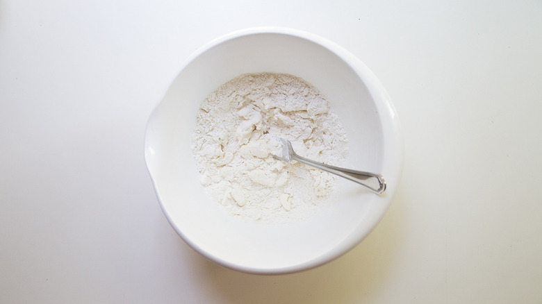 flour and butter in mixing bowl