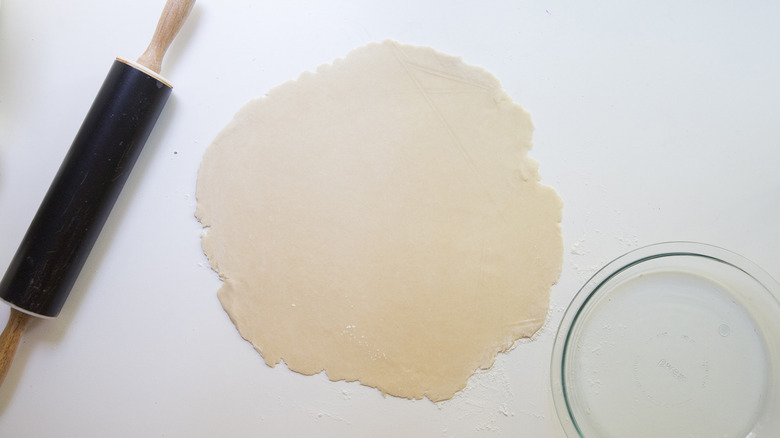 rolled dough disc on table