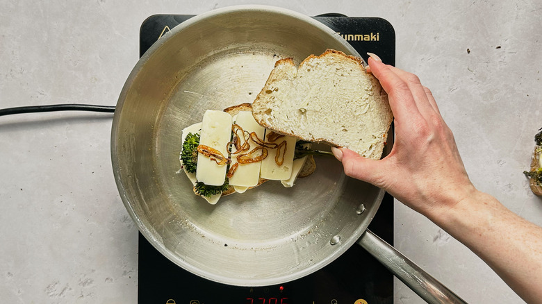 cooking sandwich in skillet