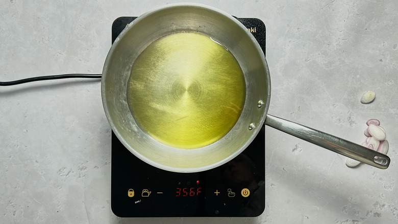 heating oil in a skillet
