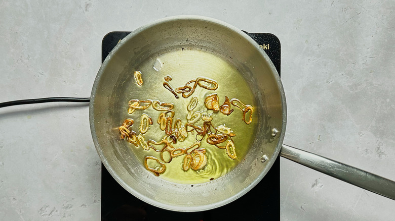 frying shallots in skillet