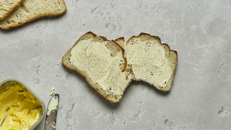 buttered pieces of bread