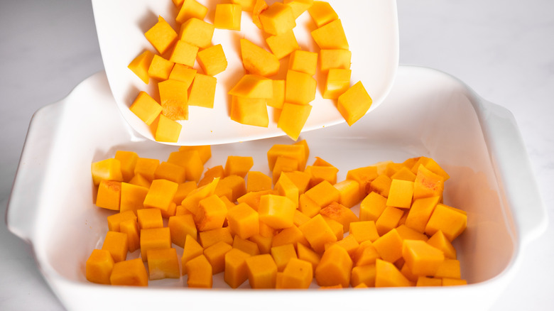 butternut squash cubes in baking dish