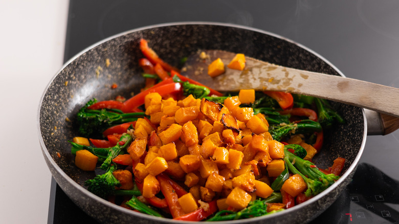 roasted butternut squash cubes in pan