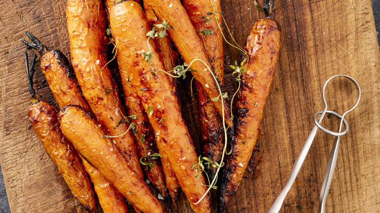 roasted carrots on cutting board