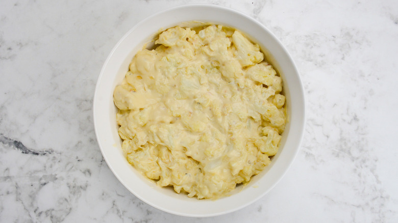 cheesy cauliflower in baking dish