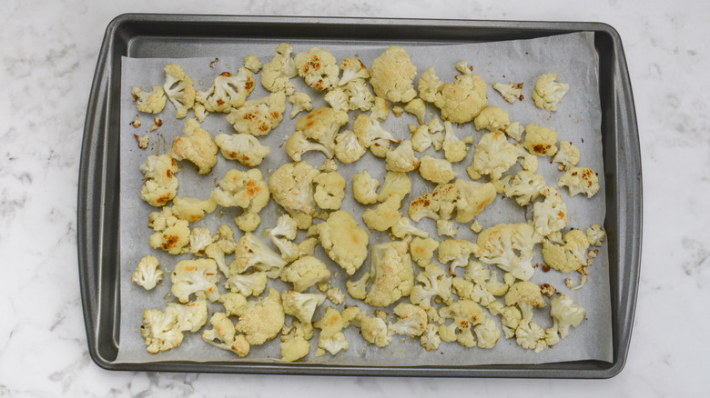 roasted cauliflower florets on baking pan