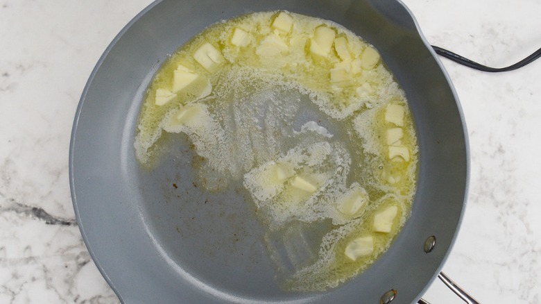 butter melting in pan