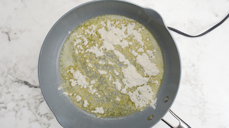 butter and flour in pan