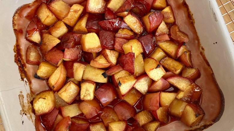 Roasted peaches in baking dish