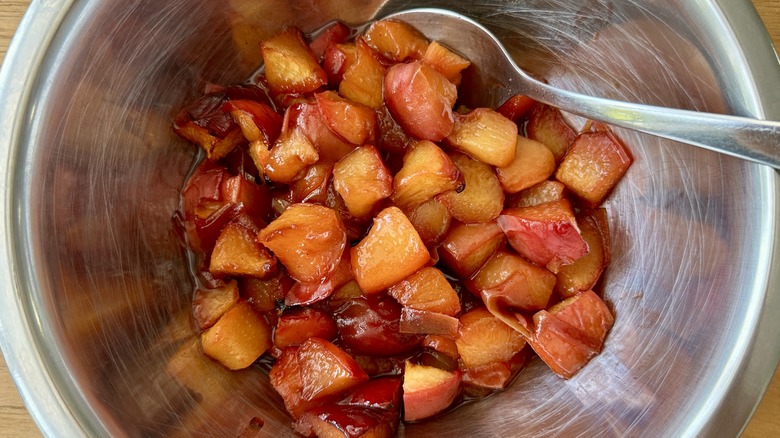 Roasted peaches in bowl