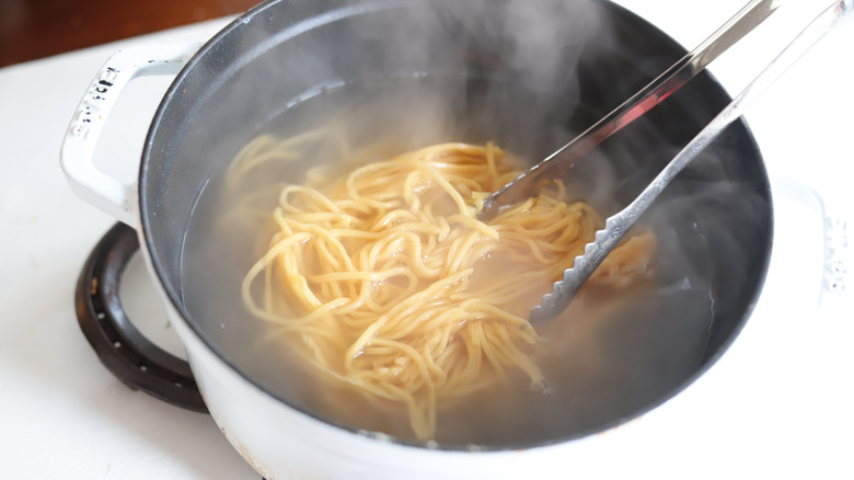 noodles boiling in pot