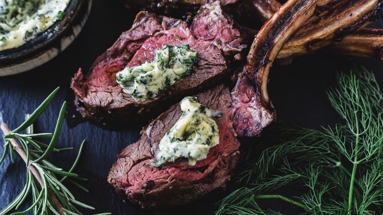 Two venison ribs with butter and herbs