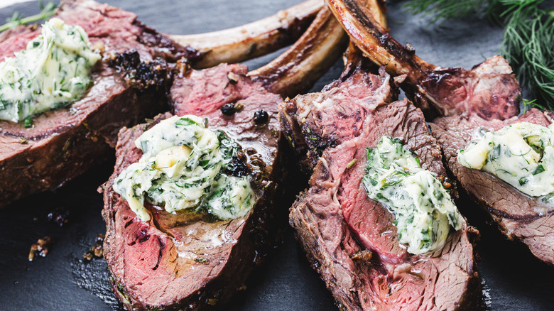 Four venison ribs with herb butter