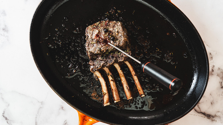 Venison rack in pan with thermometer