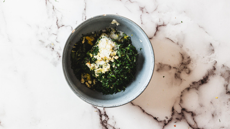 Herb butter ingredients in bowl