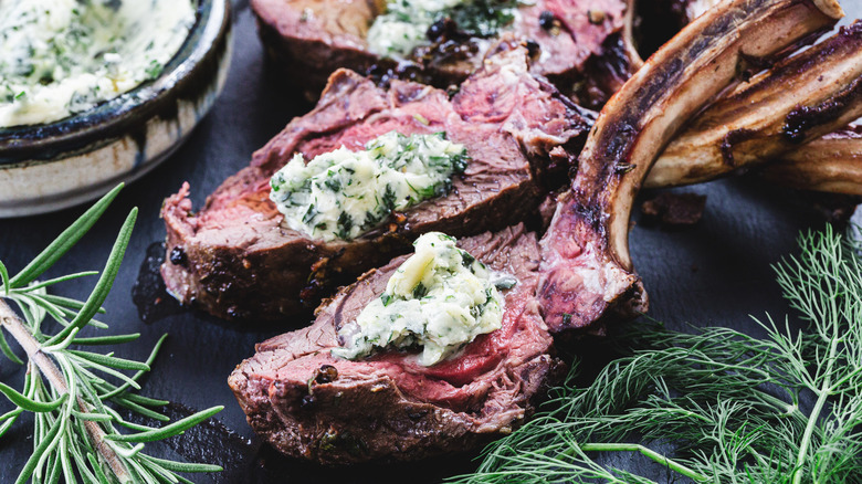 Two venison ribs with butter and herbs