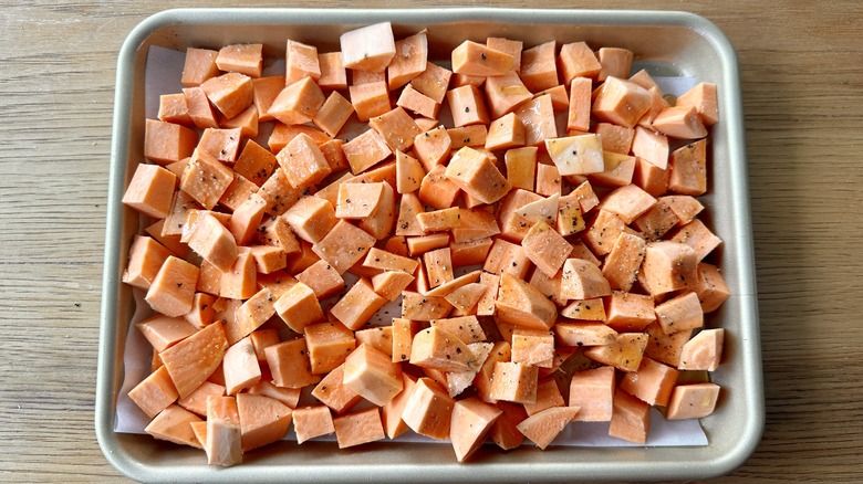 cubed sweet potatoes on sheet
