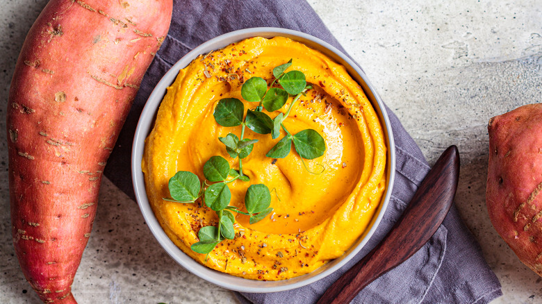 Sweet potato dip next to sweet potatoes